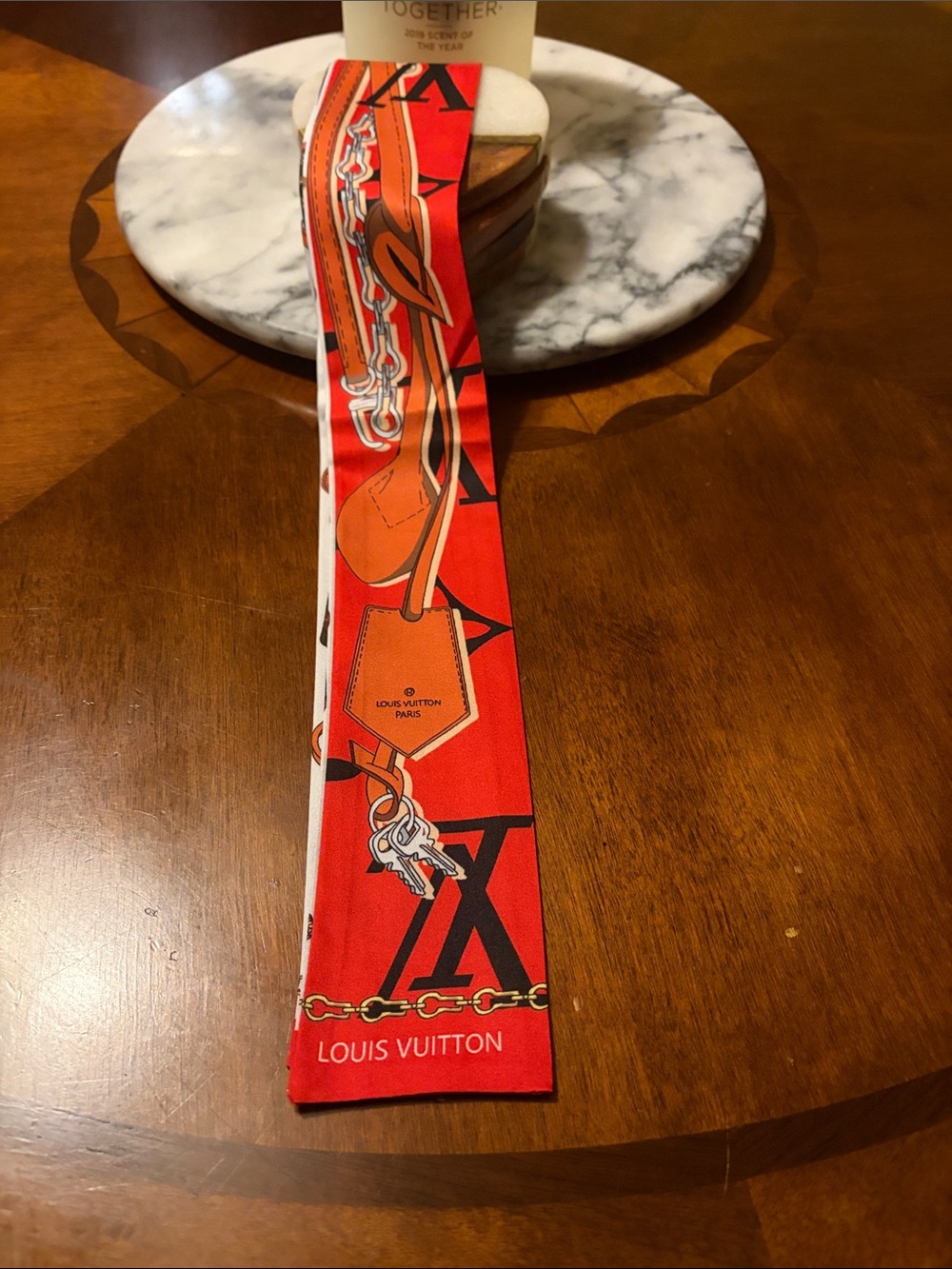 Louis Vuitton red and Black Silk Twilly with Chain & Key Motif